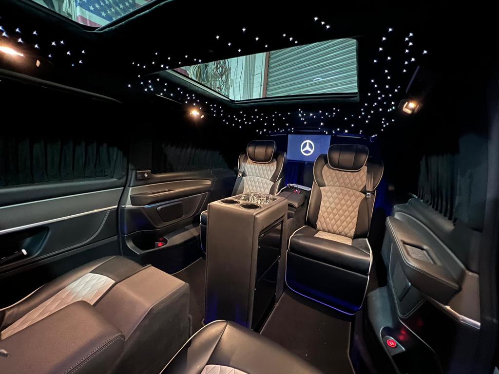 Luxury bus hire mercedes v class interior seats