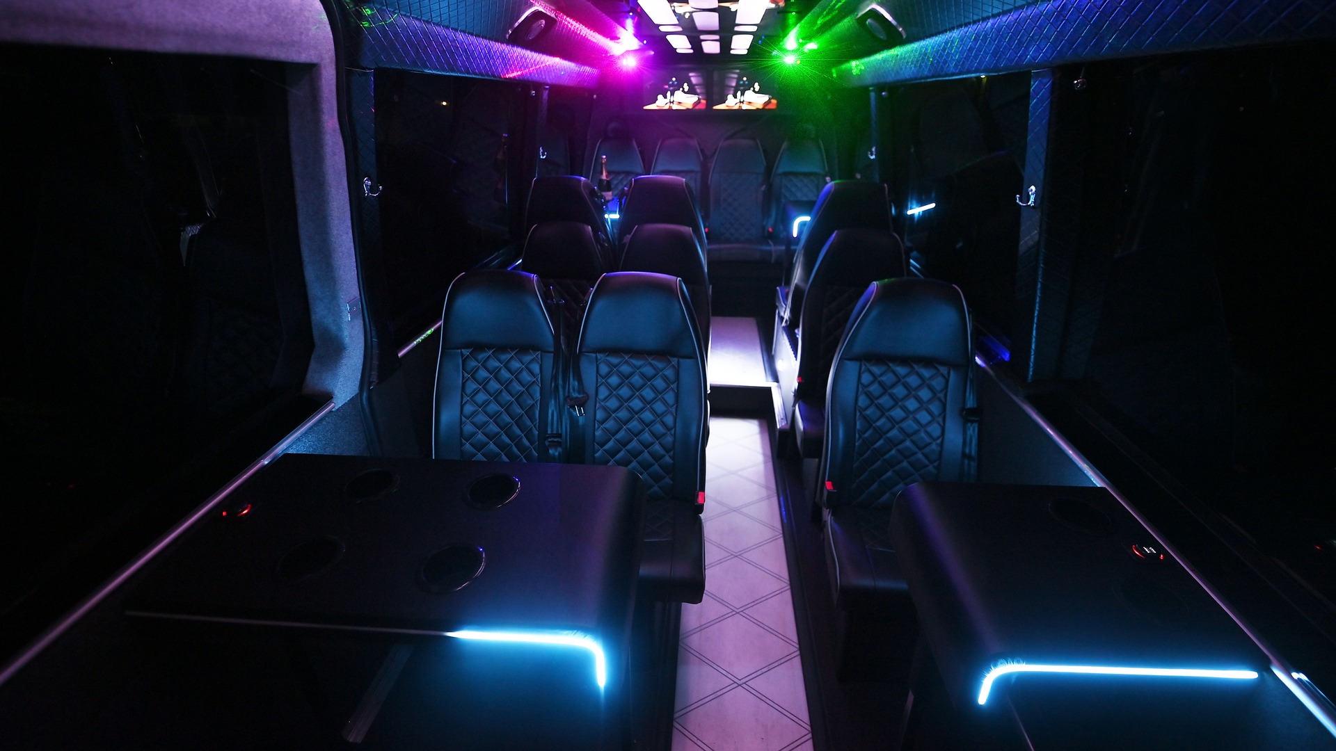 VIP Buses 2010 Mercedes Sprinter 16 Seater Party Bus aisle forward tables lit cyan either side