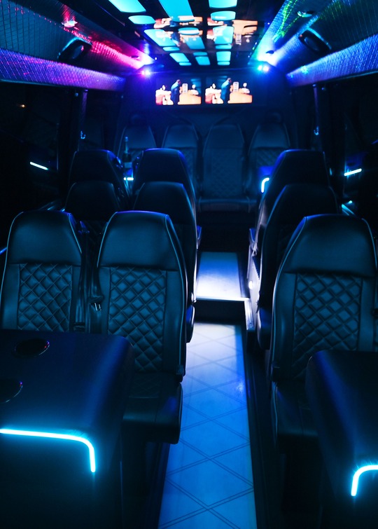 VIP Buses 2010 Mercedes Sprinter 16 Seater Party Bus aisle forward with the lit floor drawing the eye