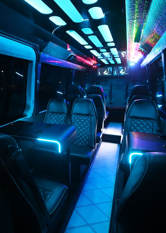 VIP Buses 2010 Mercedes Sprinter 16 Seater Party Bus aisle from the rear tables and seats to the right