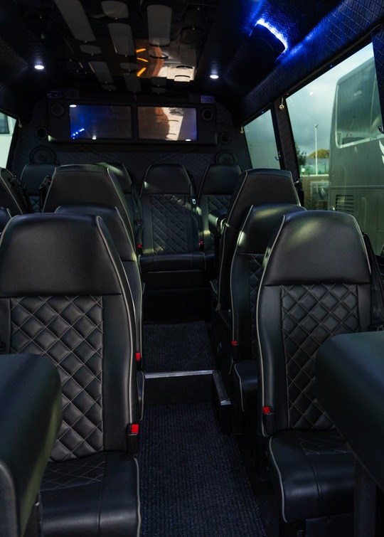 VIP Buses 2010 Mercedes Sprinter 16 Seater Party Bus cabin looking forward past the branded window