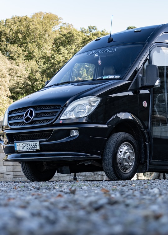 VIP Buses 2010 Mercedes Sprinter 16 Seater Party Bus parked on gravel below the house facade