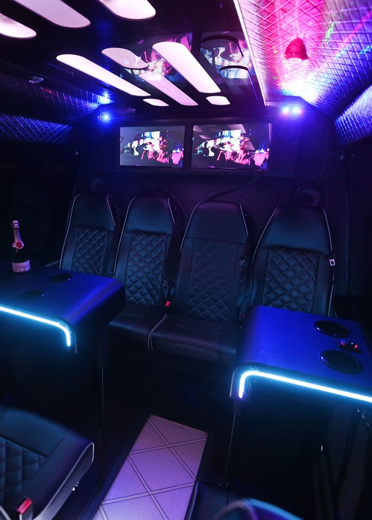 VIP Buses 2010 Mercedes Sprinter 16 Seater Party Bus rear bench with bottles under violet light