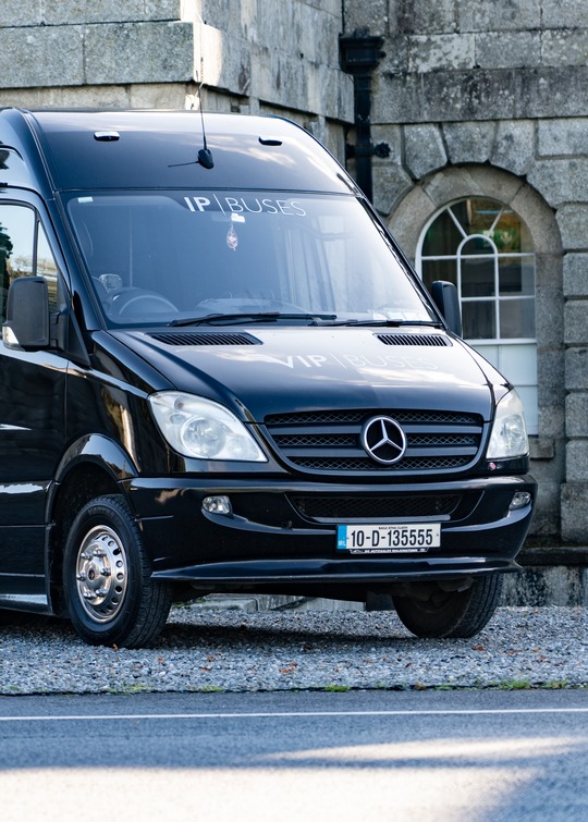 VIP Buses 2010 Mercedes Sprinter 16 Seater Party Bus rear three quarter with the boarding door open