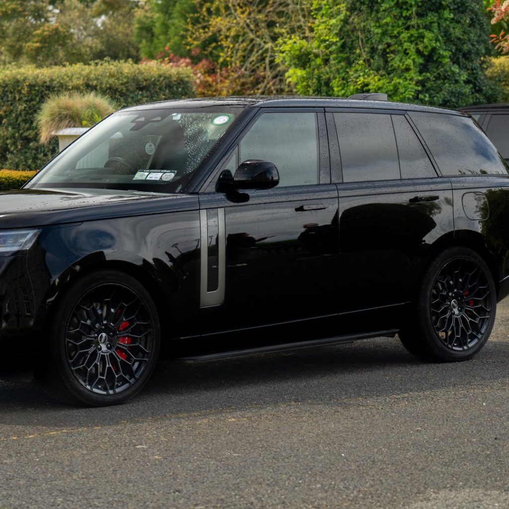 VIP Buses Black Range Rover Vogue SWB front three quarter with the second car behind