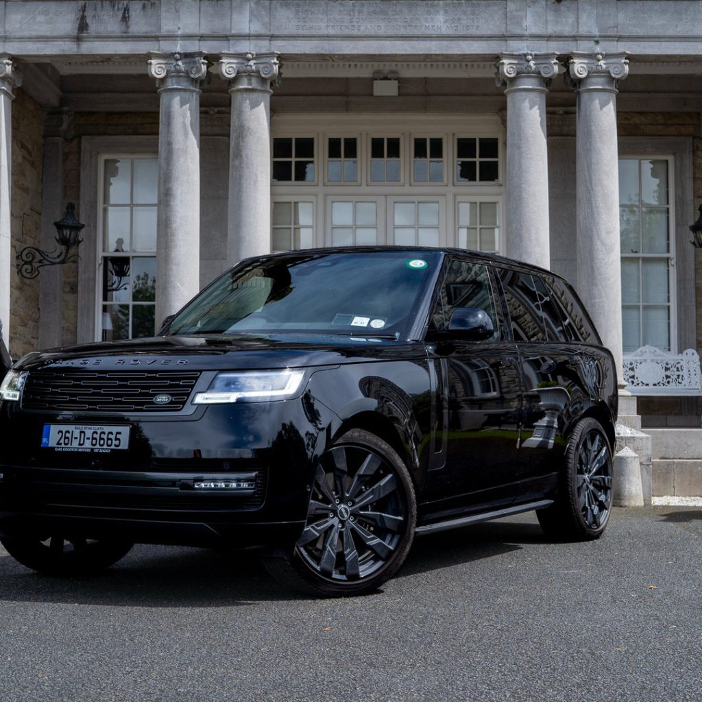 VIP Buses Black Range Rover Vogue SWB front three quarter with cannons flanking the steps