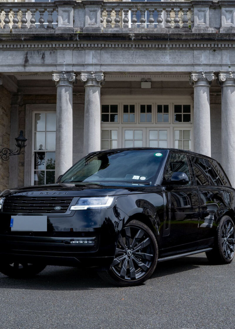 VIP Buses Black Range Rover Vogue SWB front three quarter with cannons flanking the steps