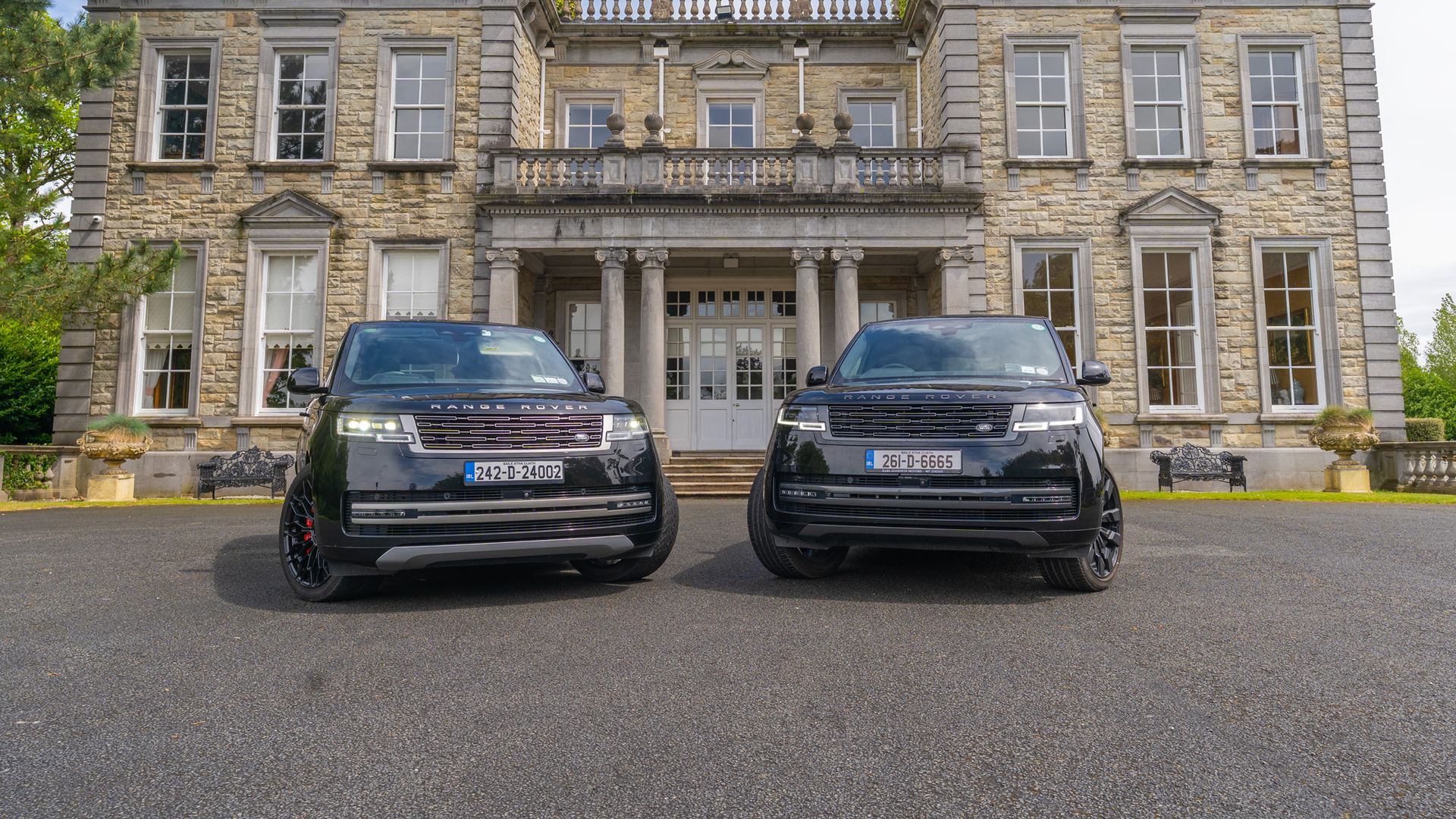 VIP Buses Black Range Rover Vogue SWB pair head on before a georgian country house