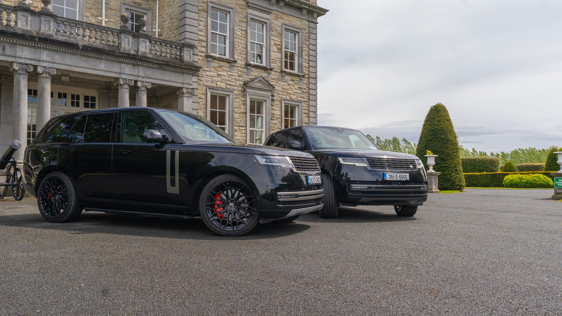 VIP Buses Black Range Rover Vogue SWB pair with the house left and open countryside right