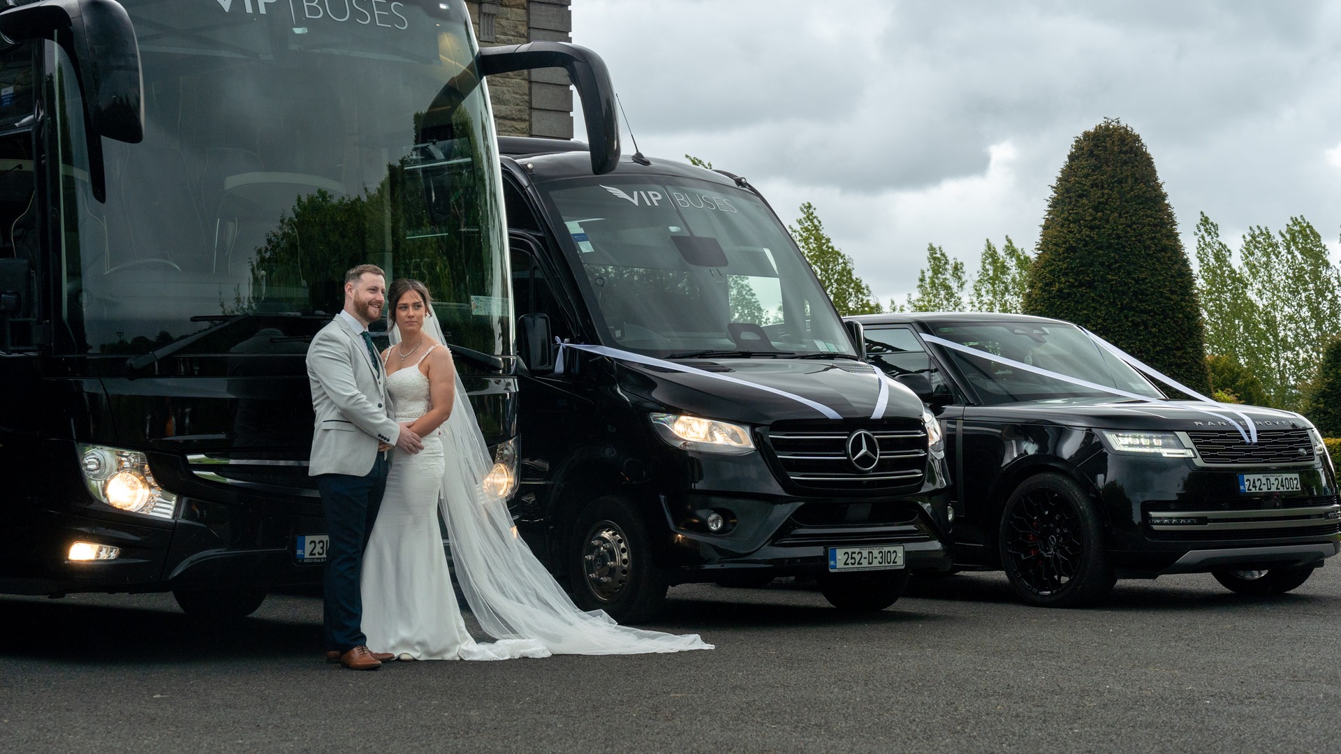 VIP Buses Fleet Lineup with the bride and groom beside the wedding fleet