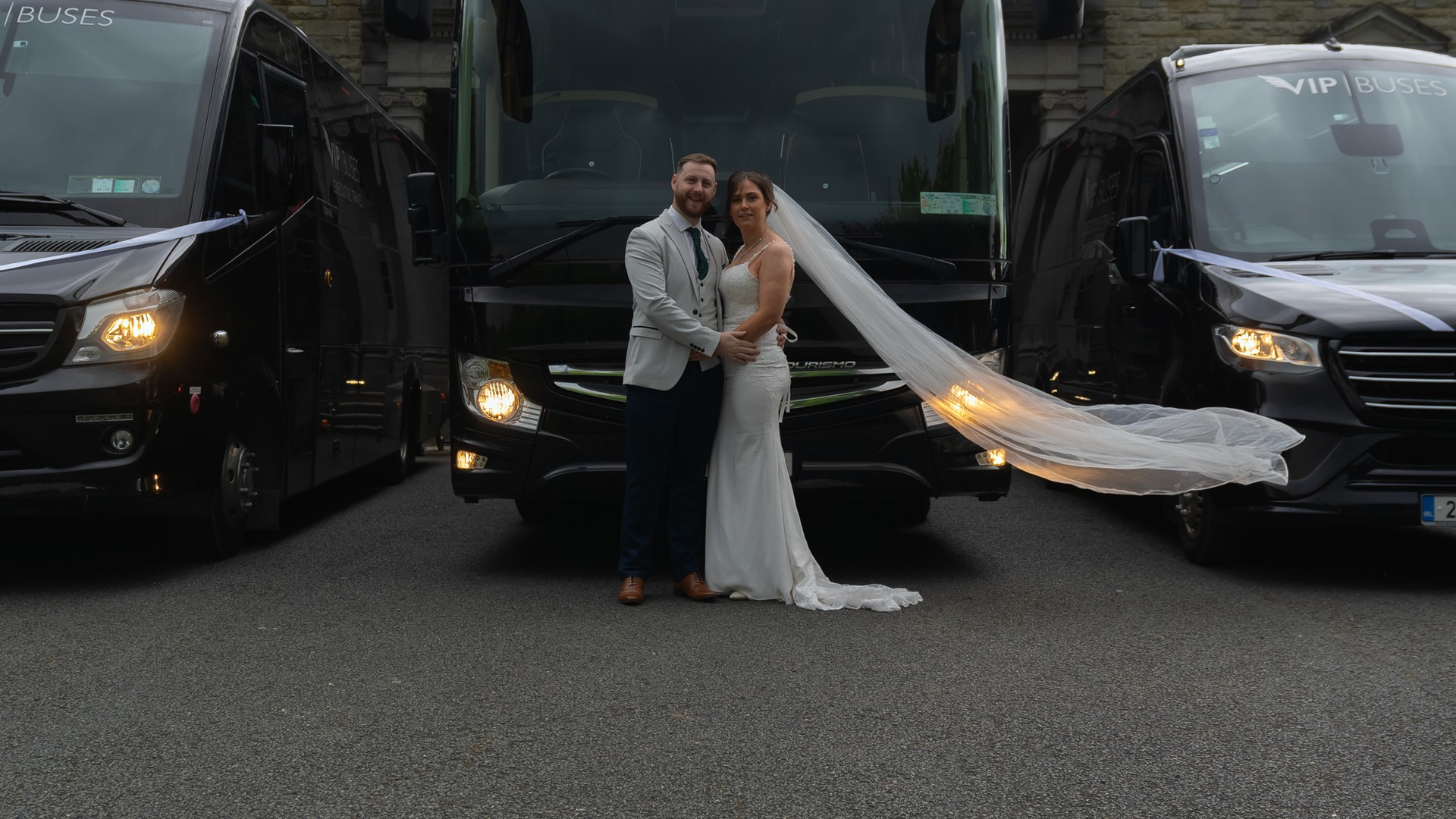VIP Buses Fleet Lineup with the couple before the coach and two minibuses