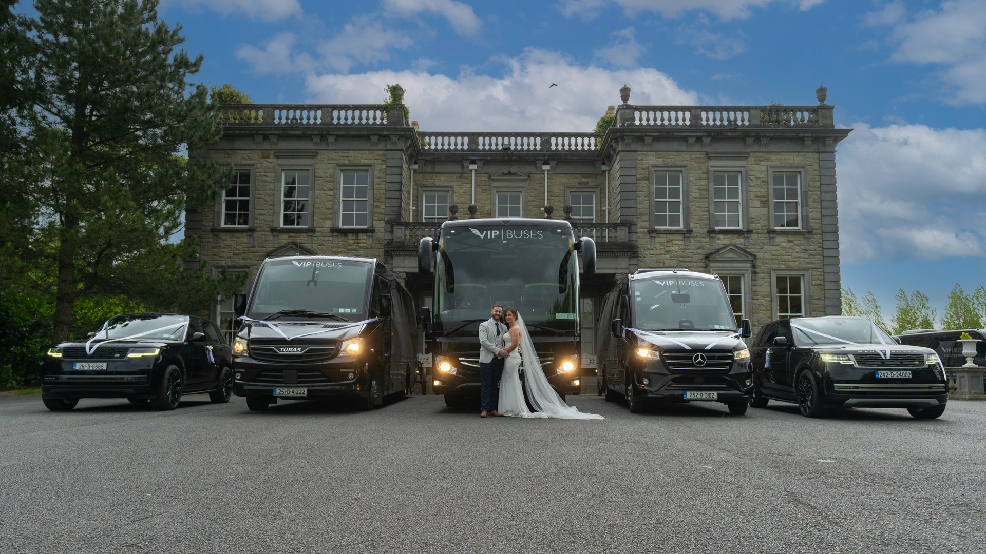 VIP Buses Fleet Lineup with the bride and groom before the full wedding fleet