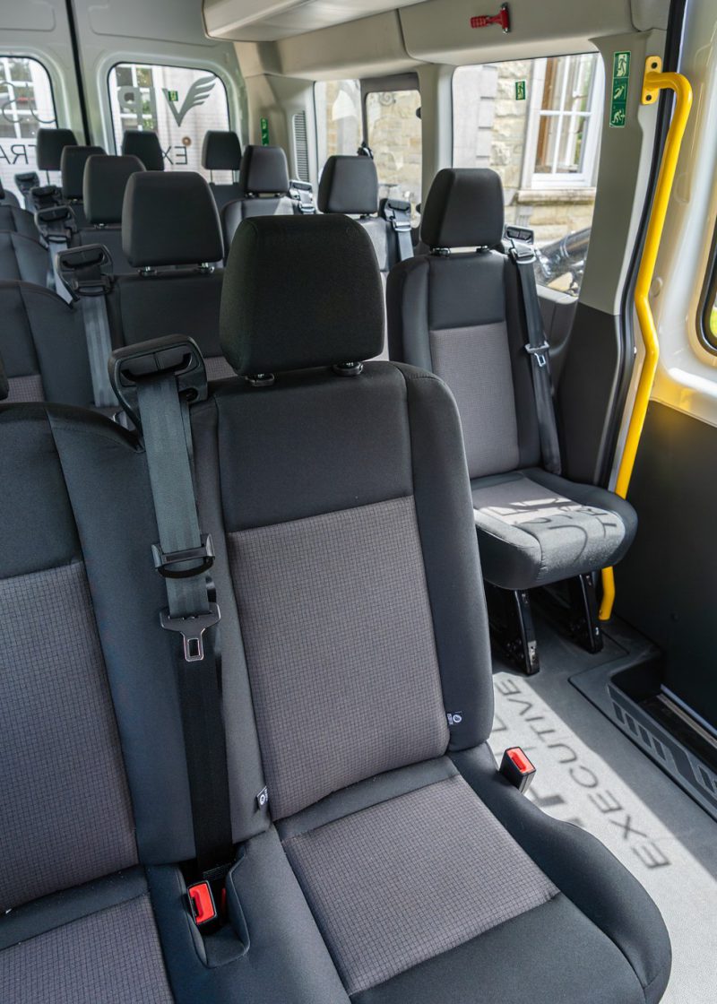 VIP Buses Ford Transit 17 Seater Minibus from the rear seats to the open side door