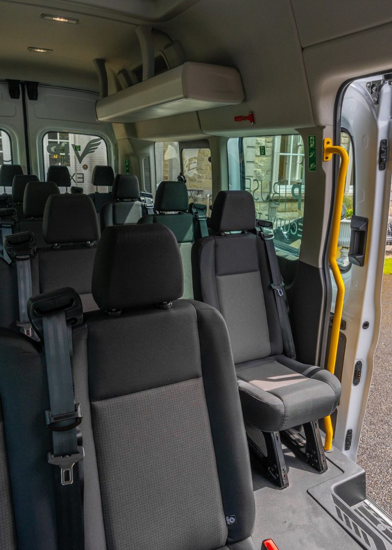 VIP Buses Ford Transit 17 Seater Minibus interior forward with the side door open