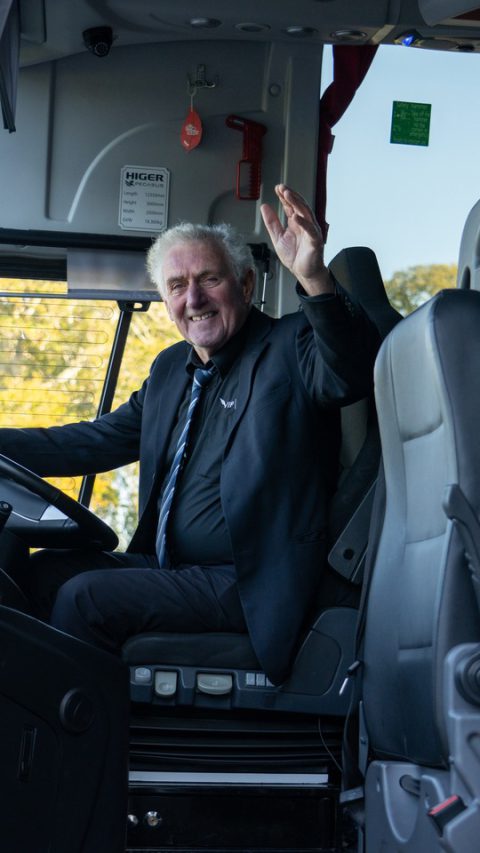 VIP Buses Higer 43 Seater Coach driver waving from the cab