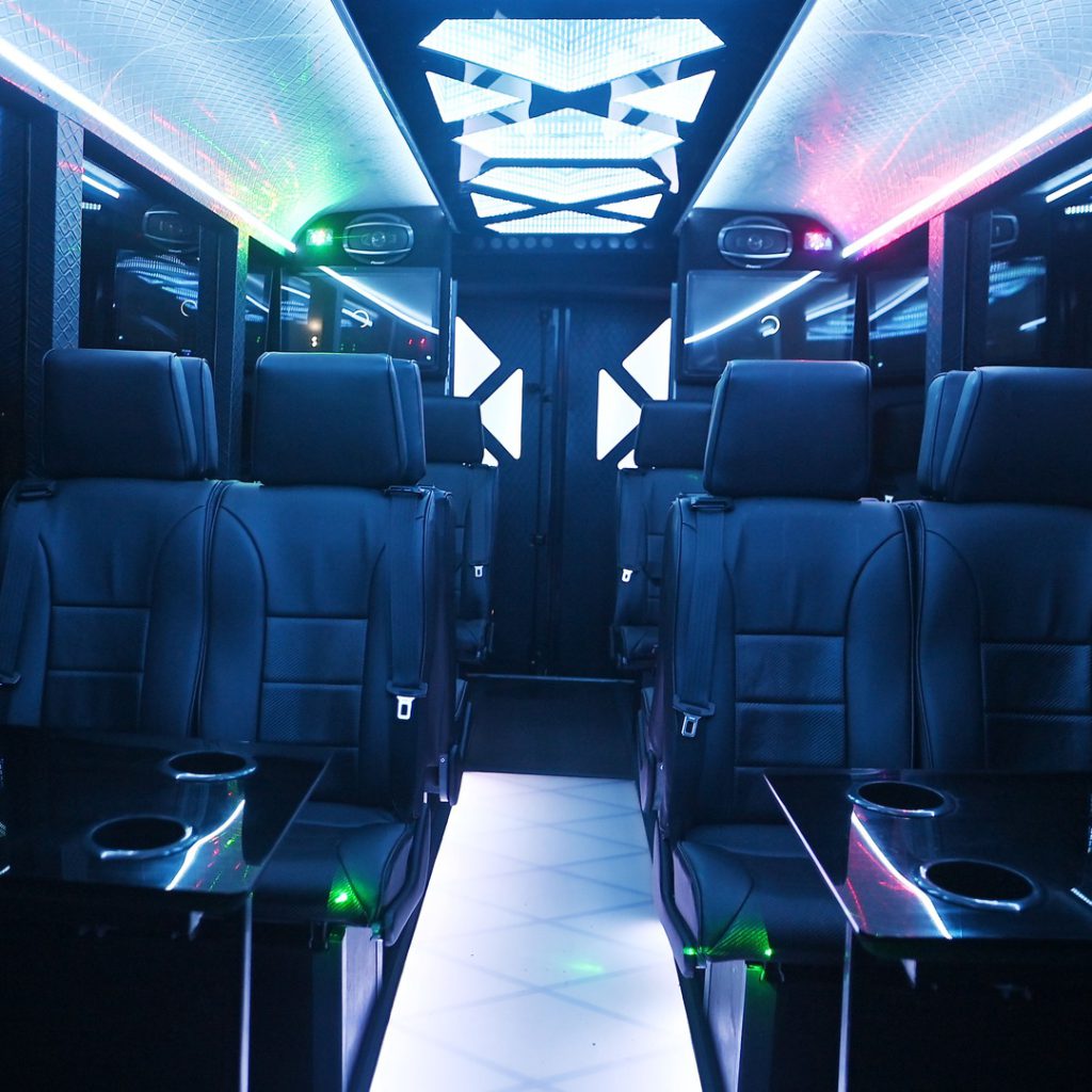VIP Buses Iveco 16 Seater Party Bus cabin down the aisle with the mirrored ceiling