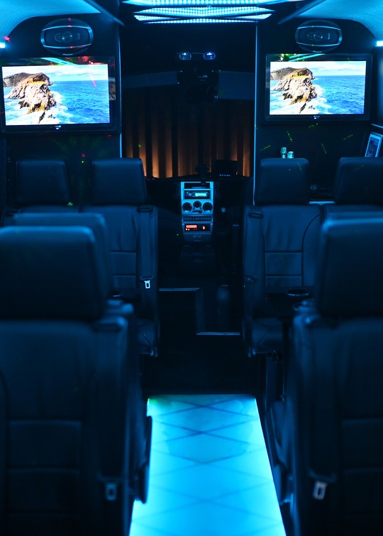 VIP Buses Iveco 16 Seater Party Bus cabin looking forward to the driver console
