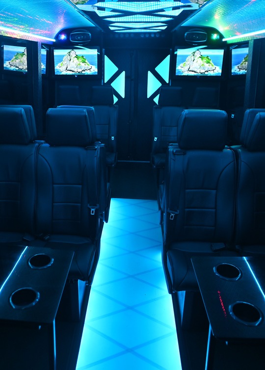 VIP Buses Iveco 16 Seater Party Bus cabin square down the aisle island scenes on every screen