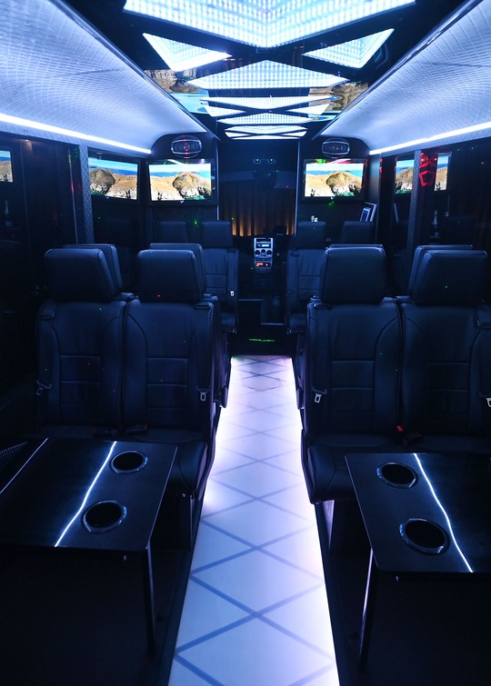 VIP Buses Iveco 16 Seater Party Bus cool white cabin down the aisle