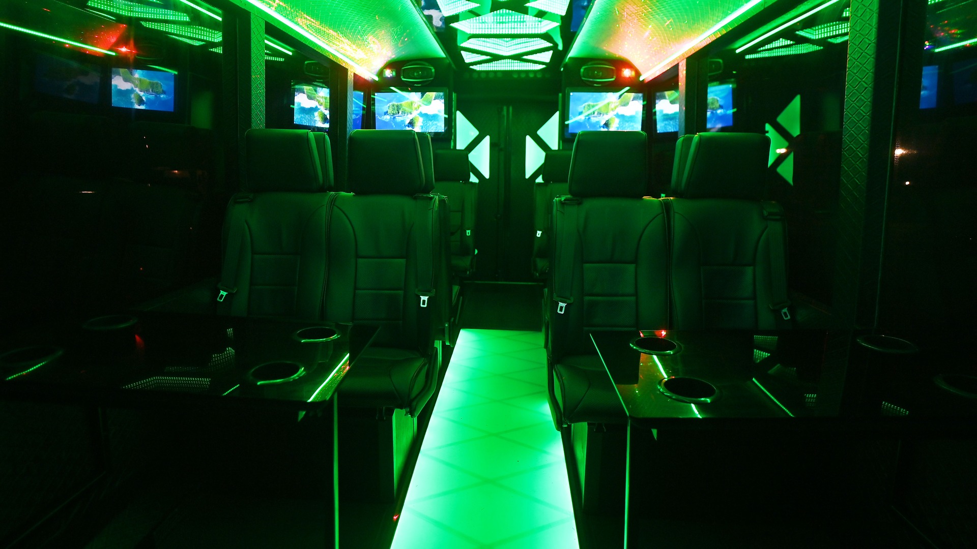 VIP Buses Iveco 16 Seater Party Bus green lit cabin with the floor glowing