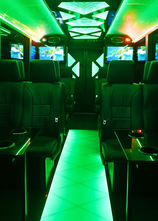 VIP Buses Iveco 16 Seater Party Bus green lit cabin with the floor glowing