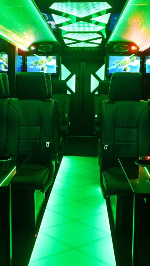 VIP Buses Iveco 16 Seater Party Bus green lit cabin with the floor glowing