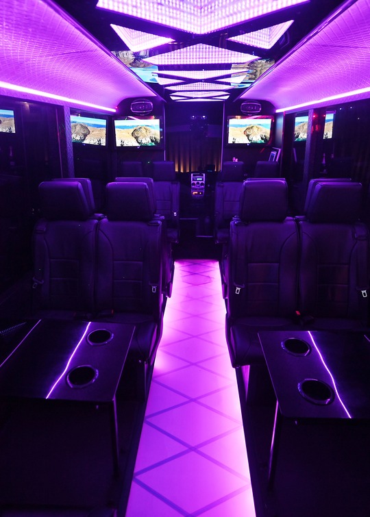VIP Buses Iveco 16 Seater Party Bus violet cabin down the aisle