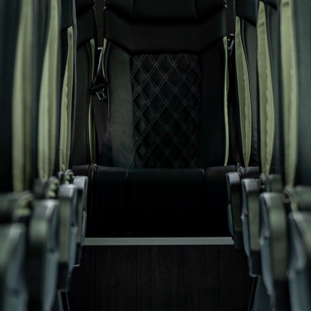 VIP Buses Mercedes Sprinter 16 Seater Minibus aisle to the rear door below the Turas sign