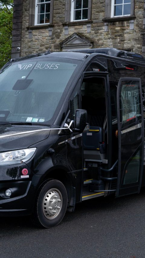 VIP Buses Mercedes Sprinter 16 Seater Minibus dressed with wedding ribbons and the door open