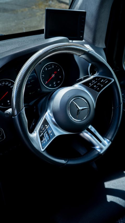 VIP Buses Mercedes Sprinter 16 Seater Minibus drivers steering wheel and dashboard dials