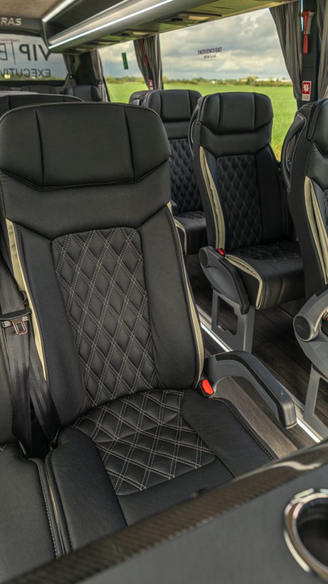 VIP Buses Mercedes Sprinter 16 Seater Minibus quilted seats with the drinks table