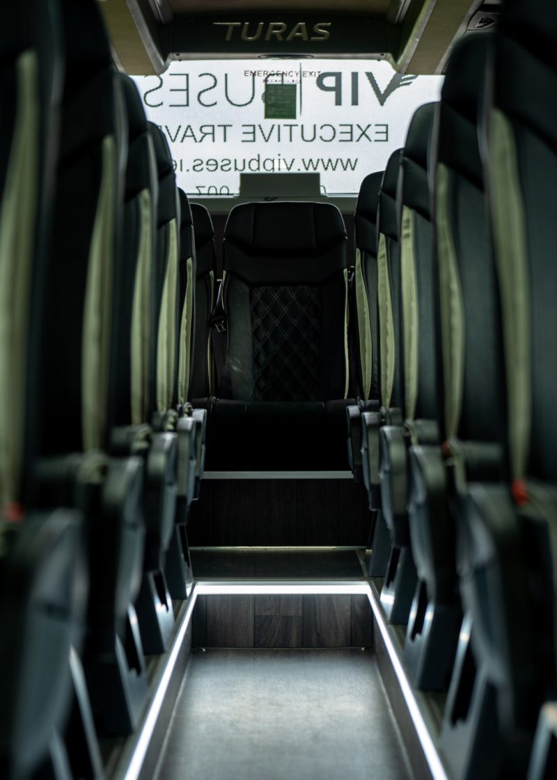 VIP Buses Mercedes Sprinter 16 Seater Minibus aisle to the rear door with the lit step