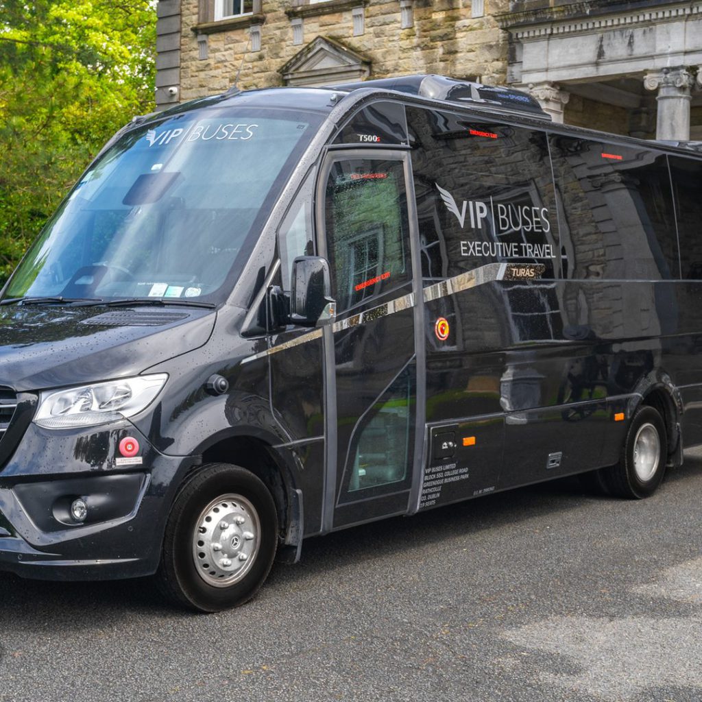 VIP Buses Mercedes Sprinter 16 Seater Minibus front three quarter under a blue sky