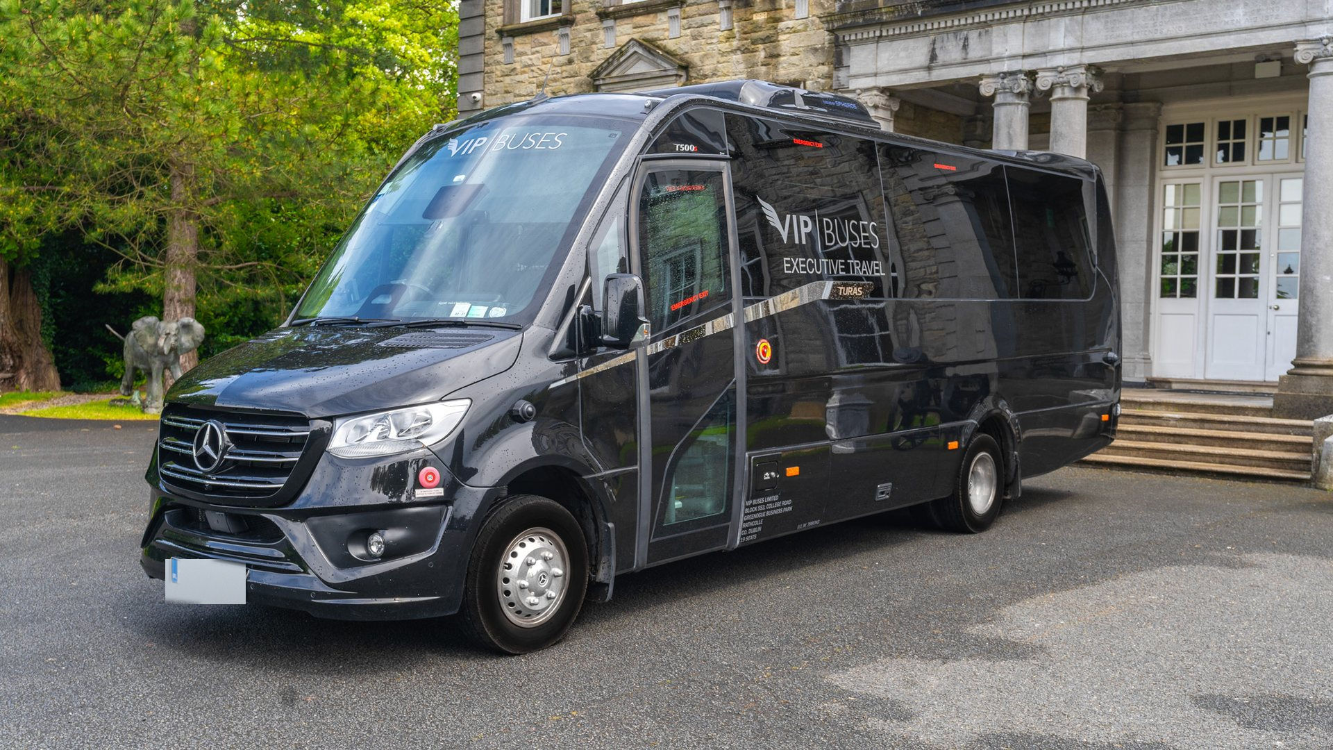VIP Buses Mercedes Sprinter 16 Seater Minibus front three quarter under a blue sky