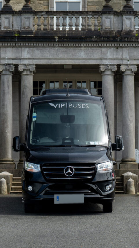 VIP Buses Mercedes Sprinter 16 Seater Minibus parked head on between two cannons