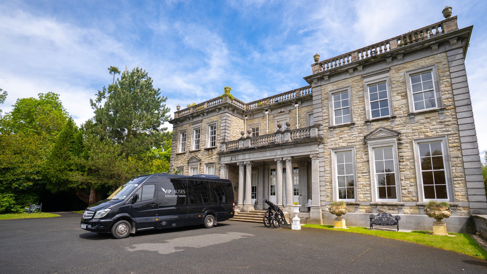 VIP Buses Mercedes Sprinter 16 Seater Minibus parked on the drive with the house behind