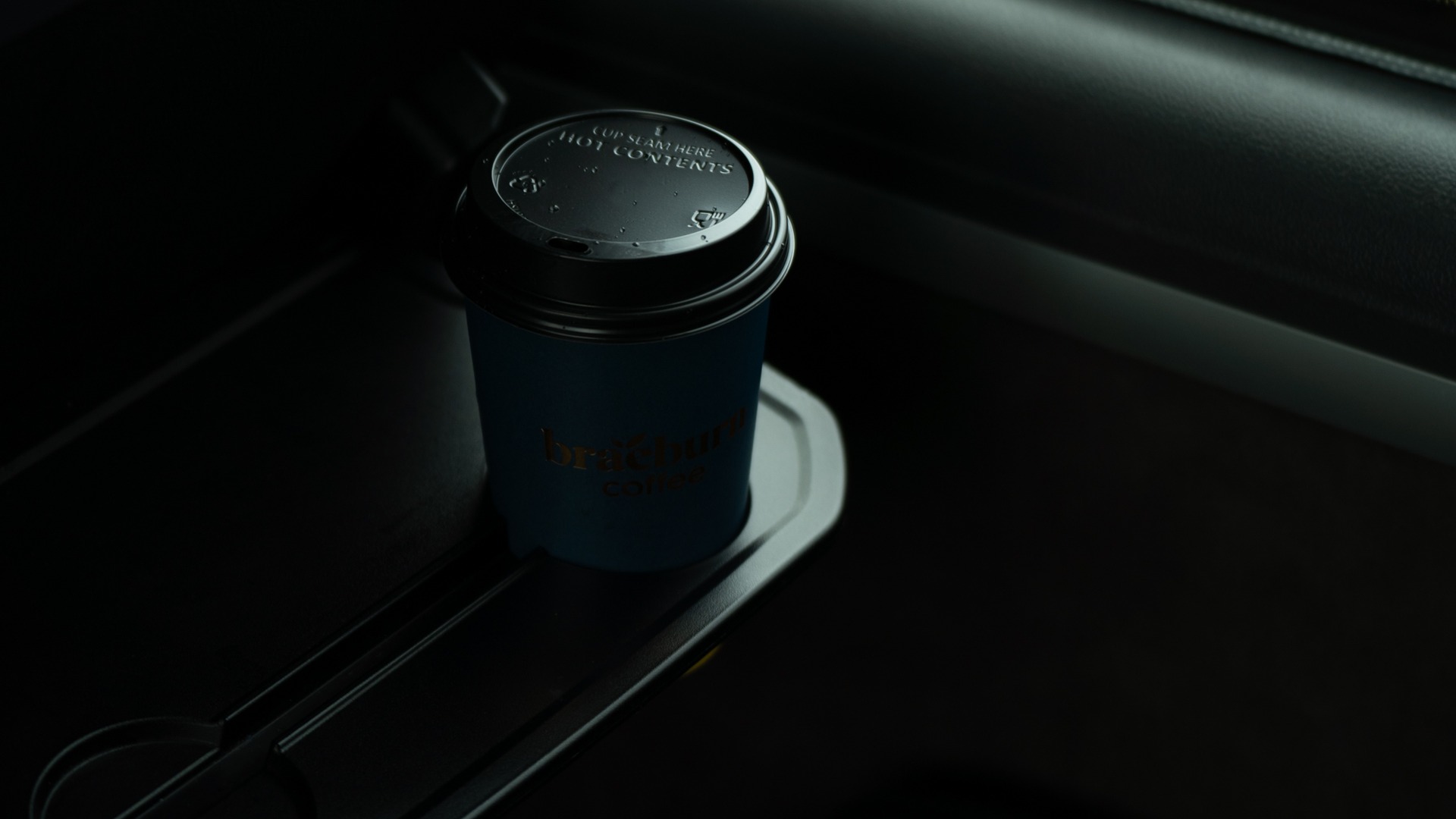 VIP Buses Mercedes Sprinter 16 Seater Minibus takeaway coffee cup in a seat back tray