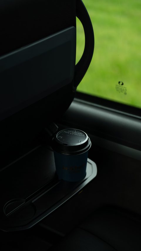 VIP Buses Mercedes Sprinter 16 Seater Minibus takeaway coffee cup in a seat back tray