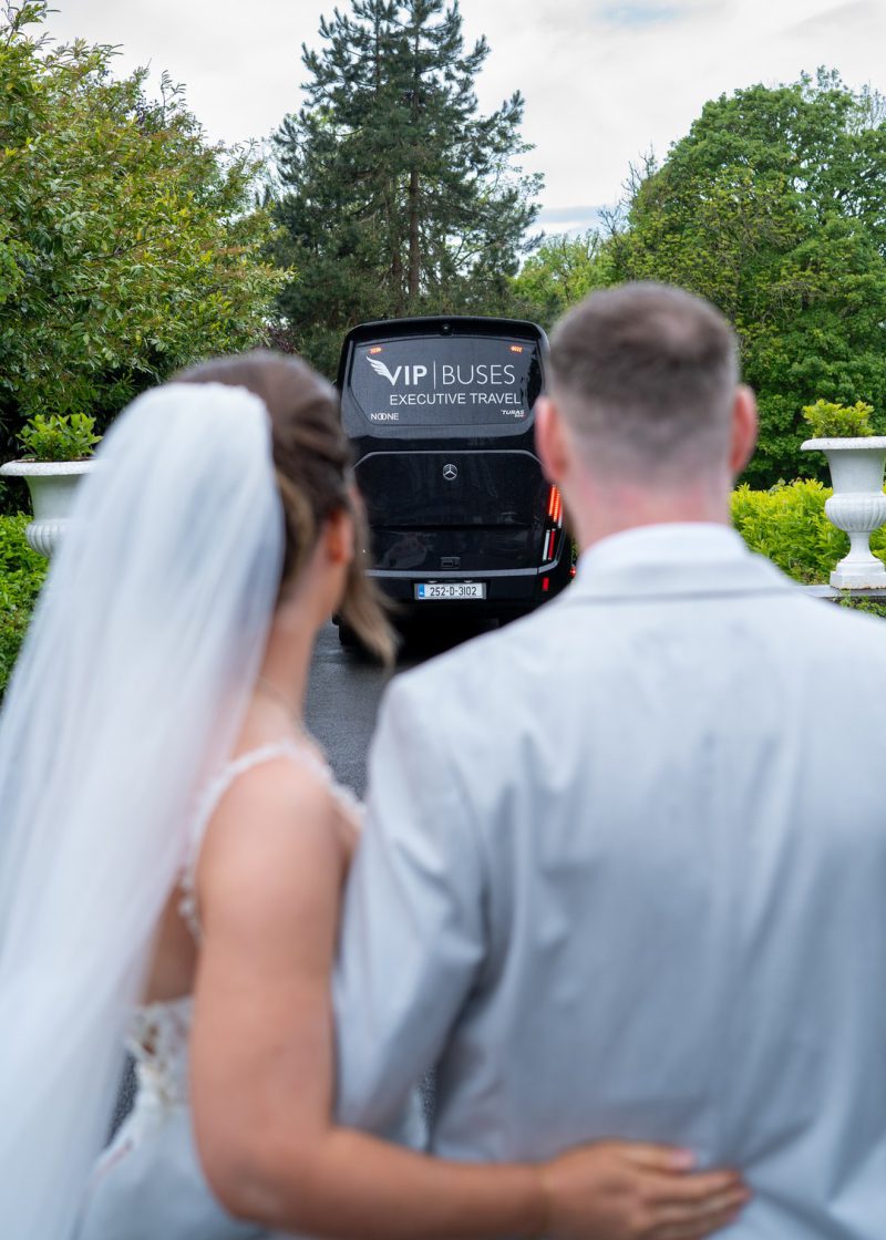VIP Buses Mercedes Sprinter 16 Seater Minibus with the bride and groom on the drive
