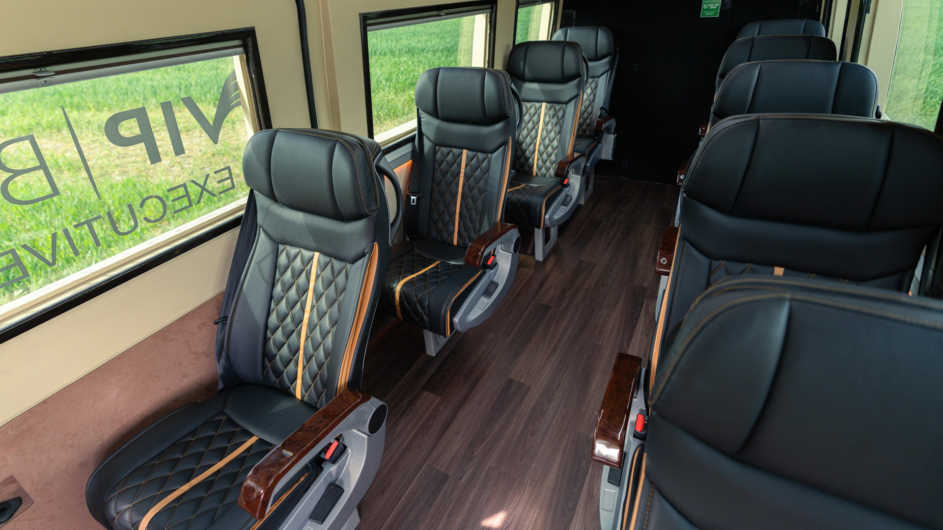 VIP Buses Mercedes Sprinter 9 Seater Minibus aisle from the front with wood effect floor