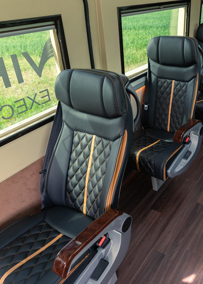 VIP Buses Mercedes Sprinter 9 Seater Minibus aisle from the front with wood effect floor