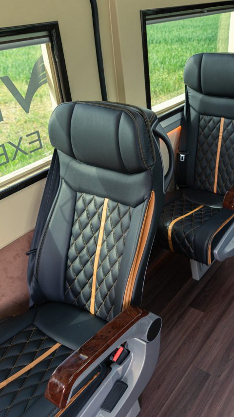 VIP Buses Mercedes Sprinter 9 Seater Minibus aisle from the front with wood effect floor