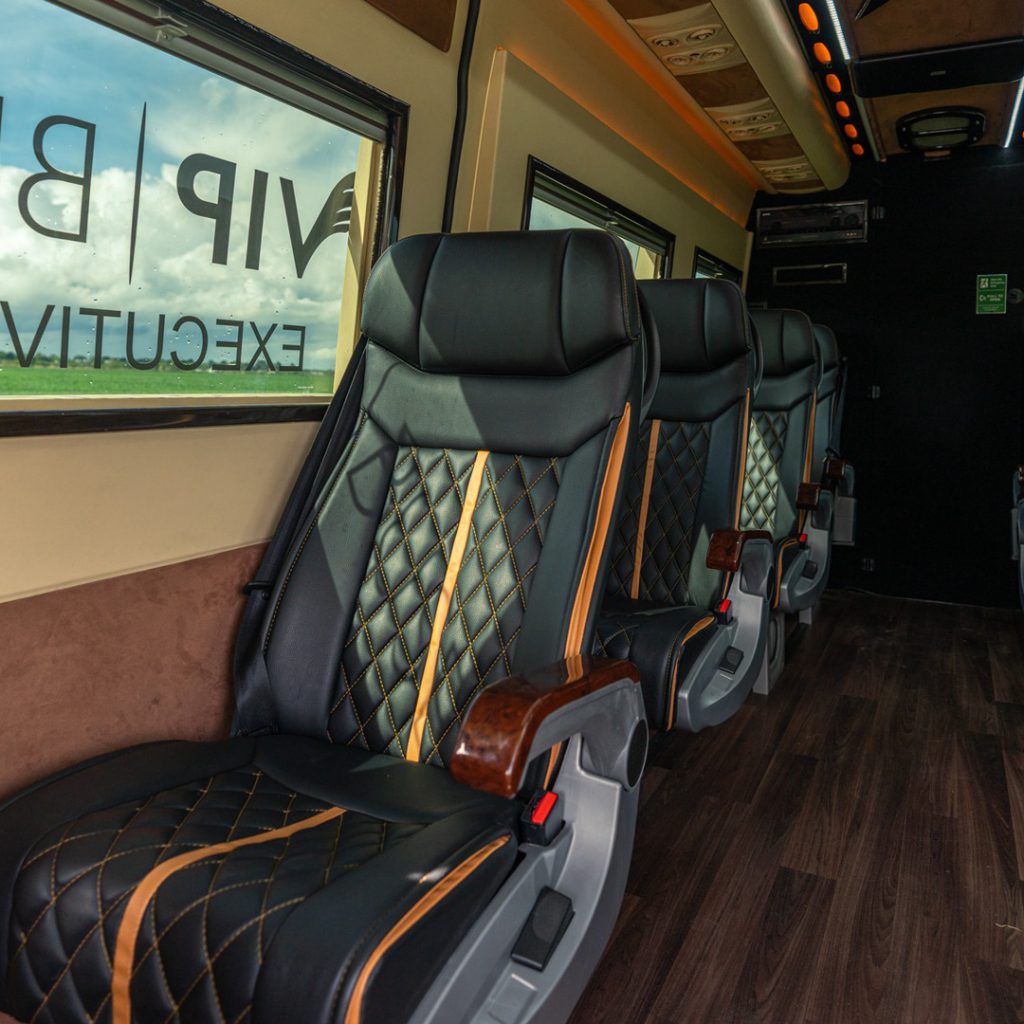 VIP Buses Mercedes Sprinter 9 Seater Minibus aisle past the quilted leather seats