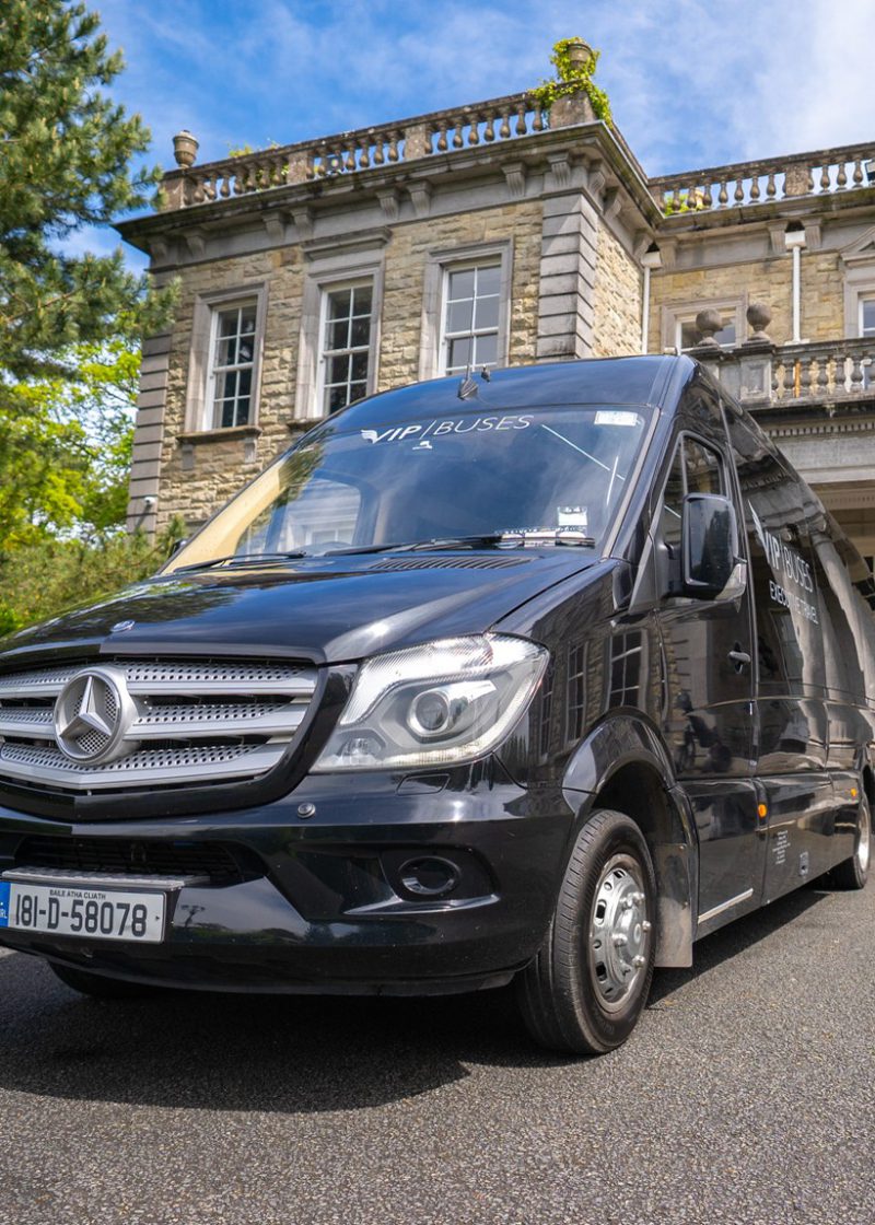 VIP Buses Mercedes Sprinter 9 Seater Minibus front three quarter low angle by the house