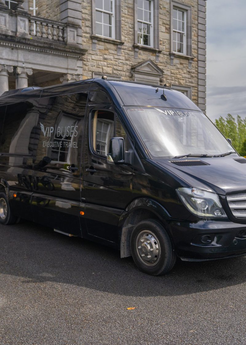 VIP Buses Mercedes Sprinter 9 Seater Minibus front three quarter outside the portico