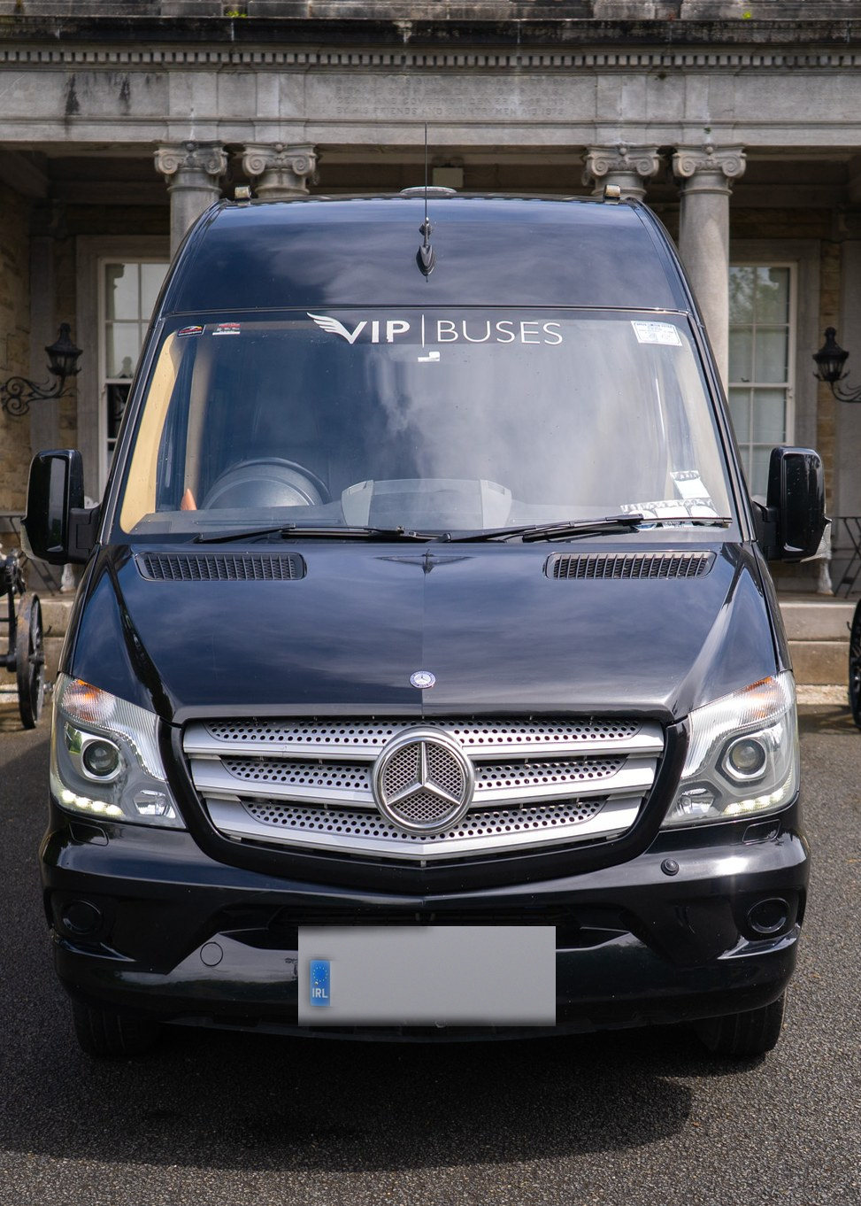 VIP Buses Mercedes Sprinter 9 Seater Minibus head on with cannons and stone urns either side