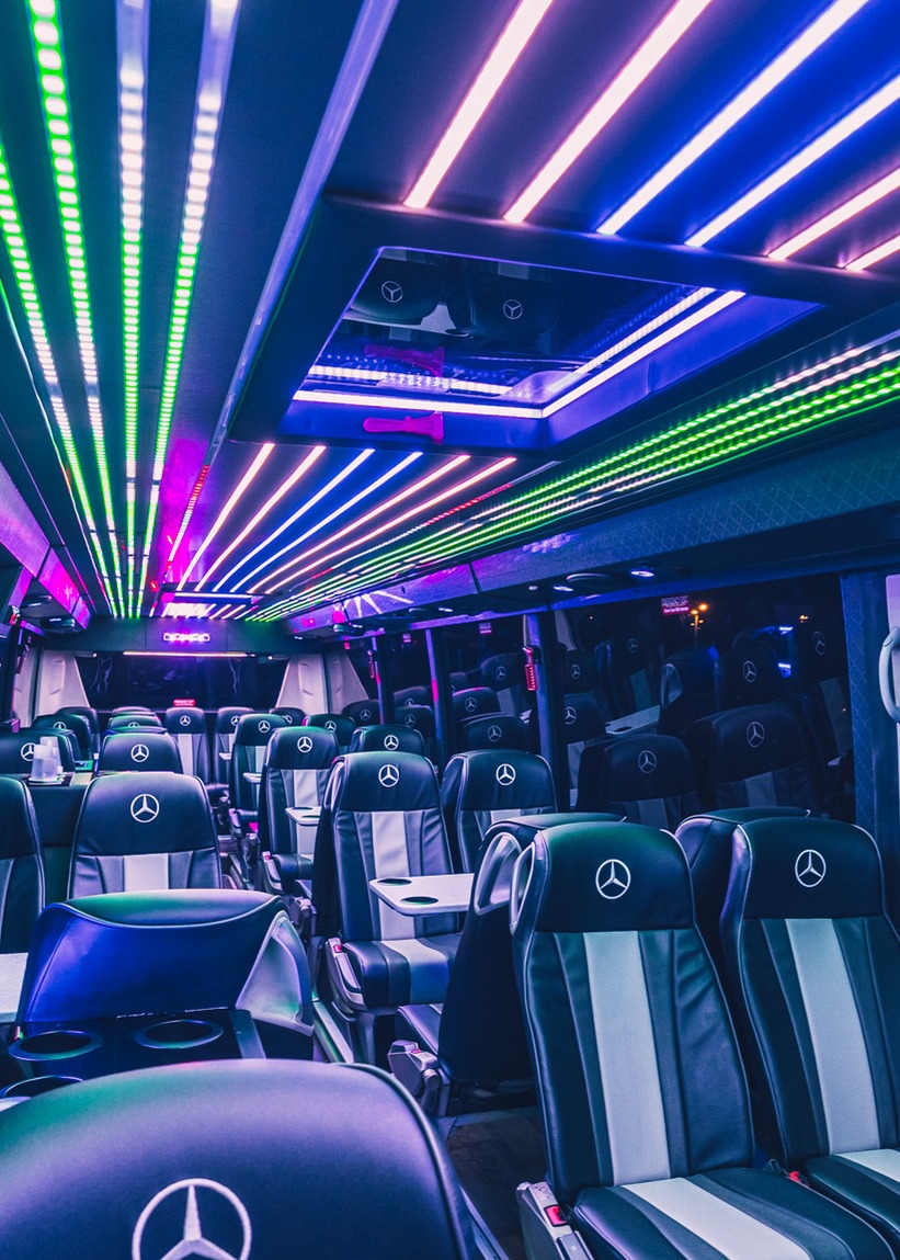 VIP Buses Mercedes Turismo 41 Seater Coach aisle at night with multicoloured ceiling LEDs
