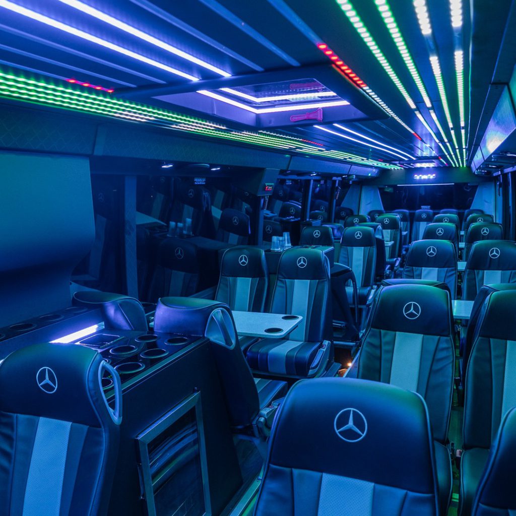 VIP Buses Mercedes Turismo 41 Seater Coach aisle at night with the drinks console in front