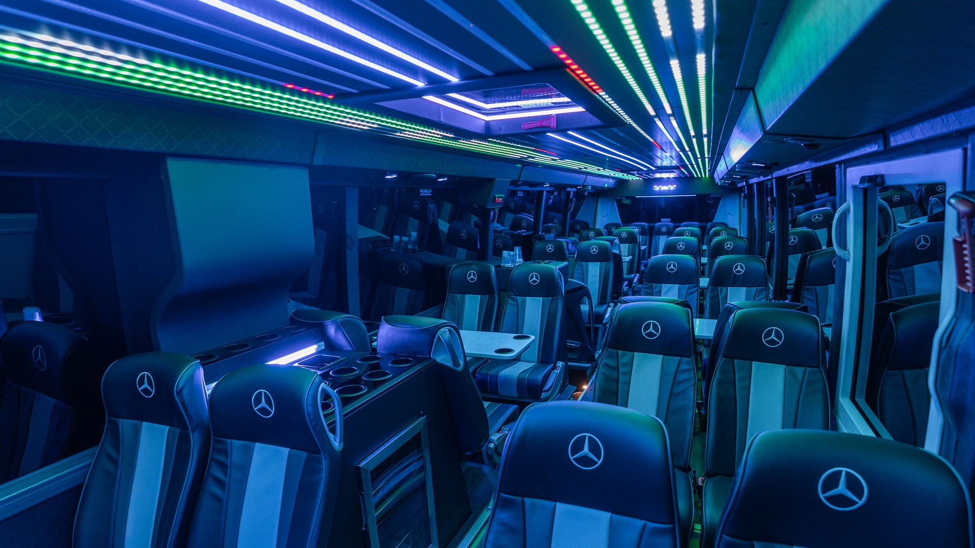 VIP Buses Mercedes Turismo 41 Seater Coach aisle at night with the drinks console in front