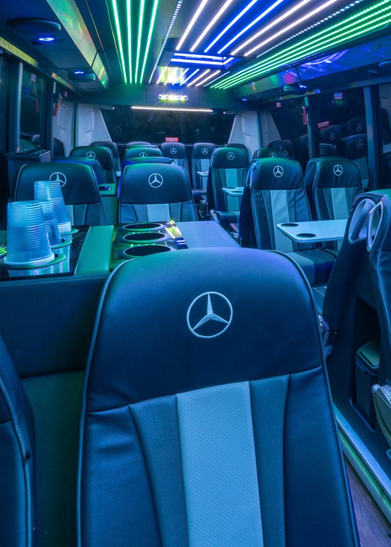 VIP Buses Mercedes Turismo 41 Seater Coach champagne bottles lined up by the lit fridge